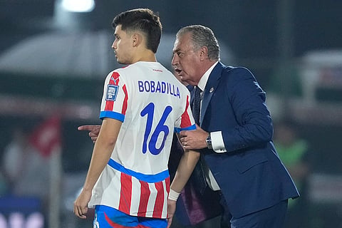 2026 FIFA World Cup Qualifying, Brazil vs Paraguay: Paraguay's Coach Gustavo Alfaro, right, gives instructions to his player Damian Bobadilla